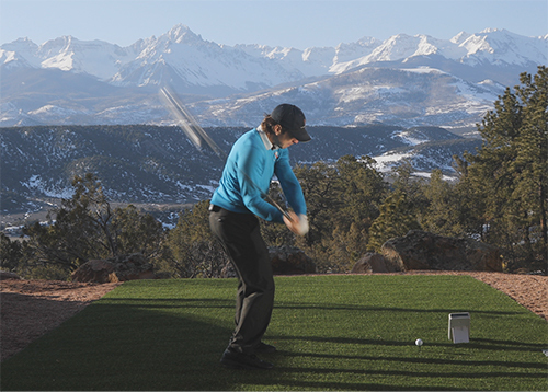 image of Chuck Quinton swinging a golf club