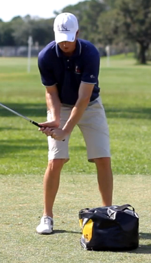 golf right shoulder in downswing